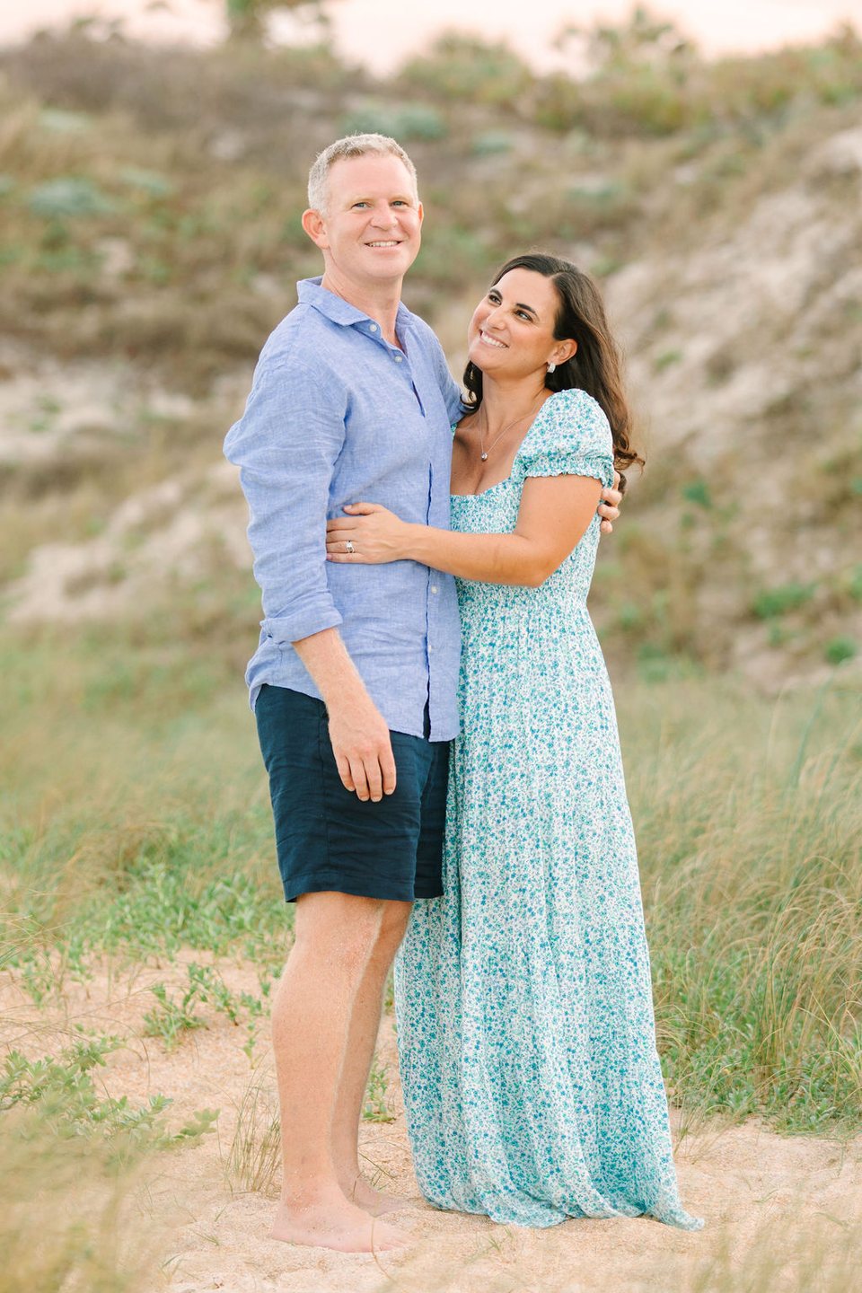 Couple embracing in the beach dunes
